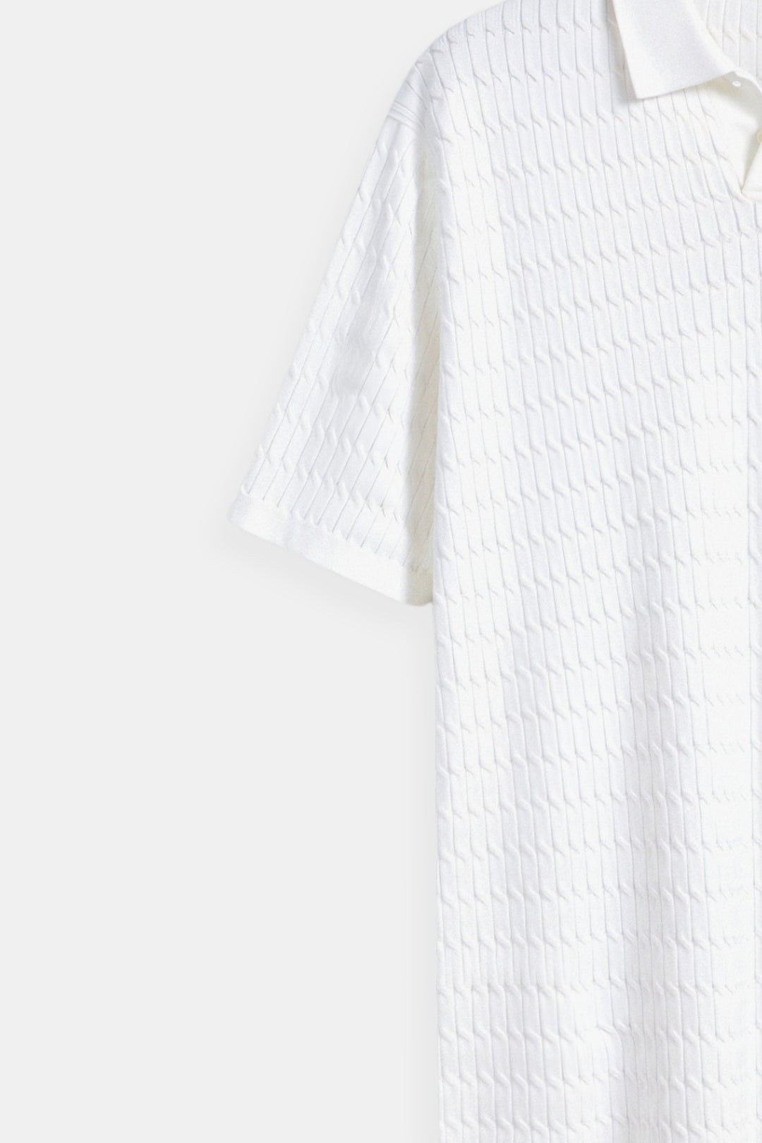 Polo en tricot blanc avec motif texturé