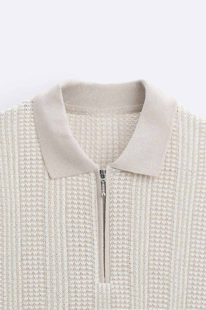 Polo structuré en tricot avec fermeture éclair