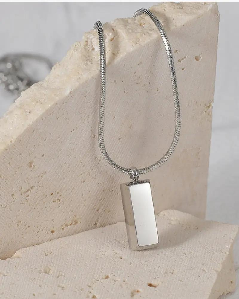 Pendentif Axis Tag